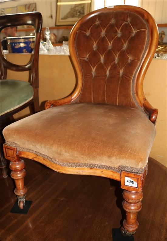 A Victorian mahogany buttoned back nursing chair(-)